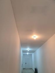 Bright hallway with white walls and lighting Nueva Gorgona luxury beach estate