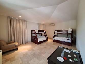 Bright bedroom with AC garden views ensuite luxury villa Buenaventura Golf & Beach Panama