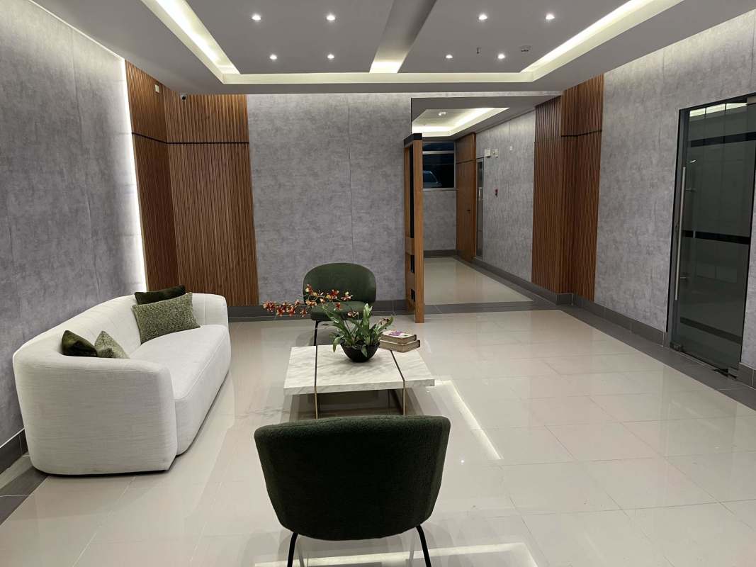 Covered rooftop social terrace with BBQ overlooking city PH Residencias del Sol Panama