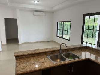 Bedroom with built-in closet, AC unit and porcelain flooring in country house San Carlos Panama