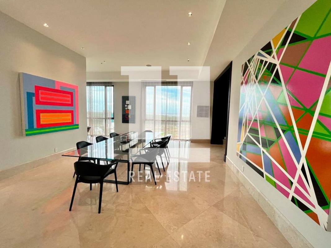 Contemporary dining area with glass table and panoramic city views in Santa Maria Court Tower East Panama