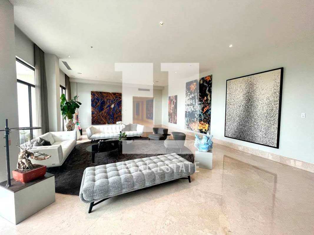 Modern living room with panoramic windows over golf course Santa Maria Panama