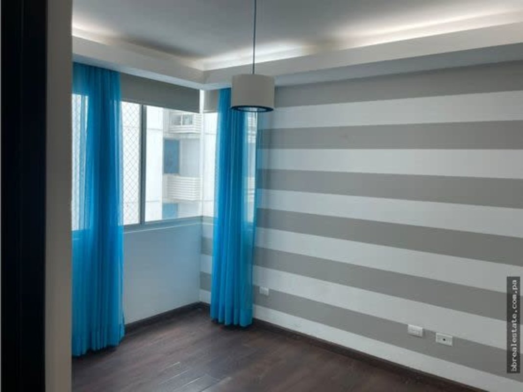 Bright master bedroom with city skyline view large windows PH Sun & Sky Punta Pacifica Panama