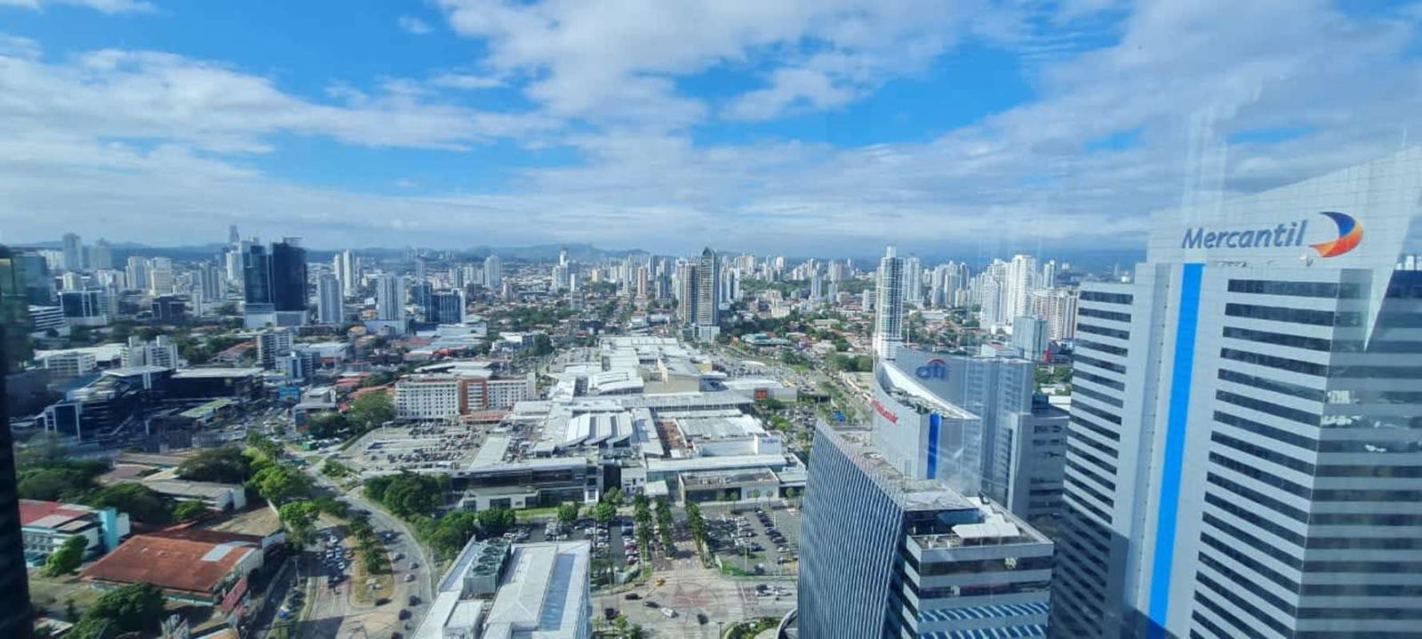 Skyline aerial of Punta Pacifica luxury towers including PH Oceania Business Plaza in Panama City financial district