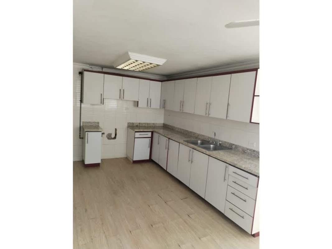 Living room with panoramic views of city skyline and Pacific Ocean in PH Mar de Plata