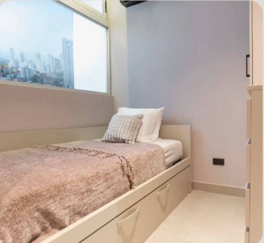 Modern bedroom with large window PH Park Square Via España Panama City
