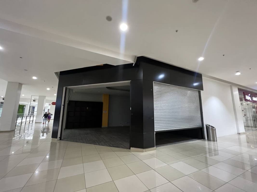 Open entrance storefront with large interior space inside Los Andes Mall Panama