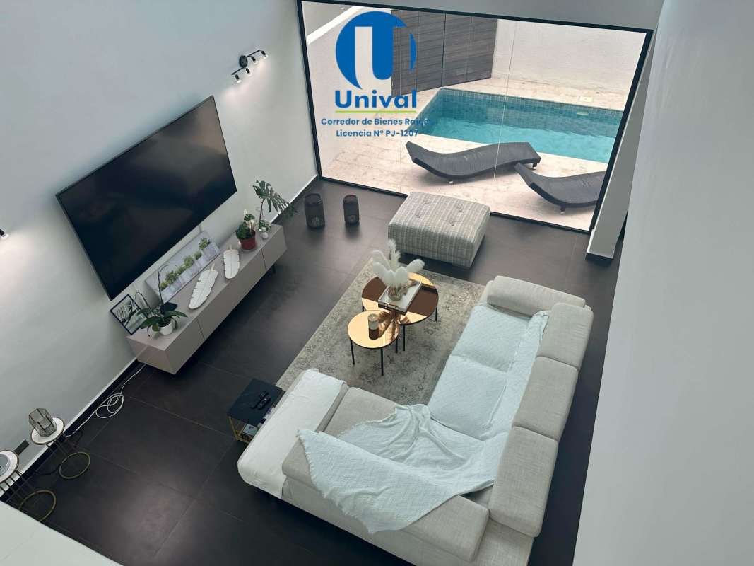 Modern granite kitchen with island and appliances in PH Costa Esmeralda home for sale