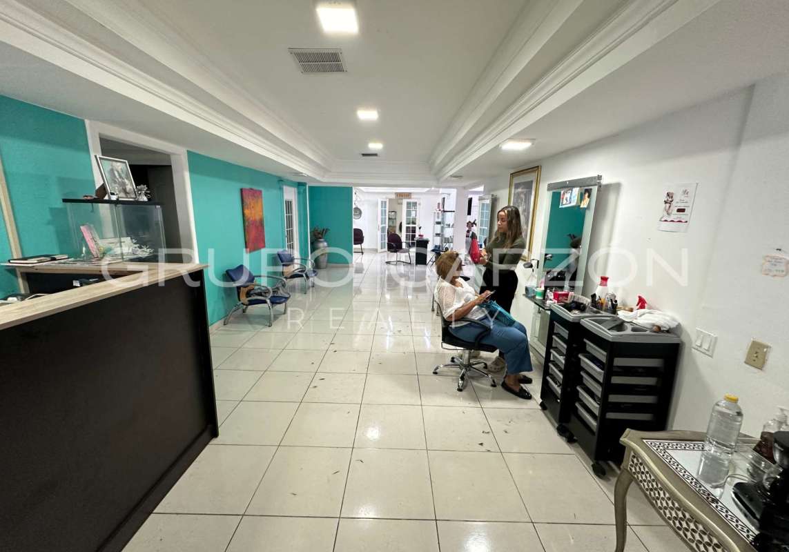 Salon or shop interior with mirrors workstation and seating San Francisco Panama