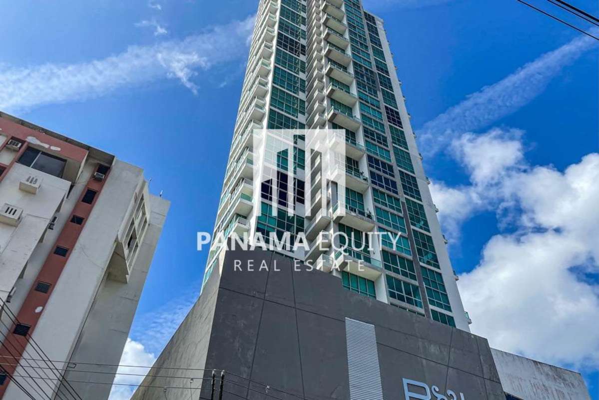Modern open dining area with floor-to-ceiling windows and balcony access in Park Loft Panama City