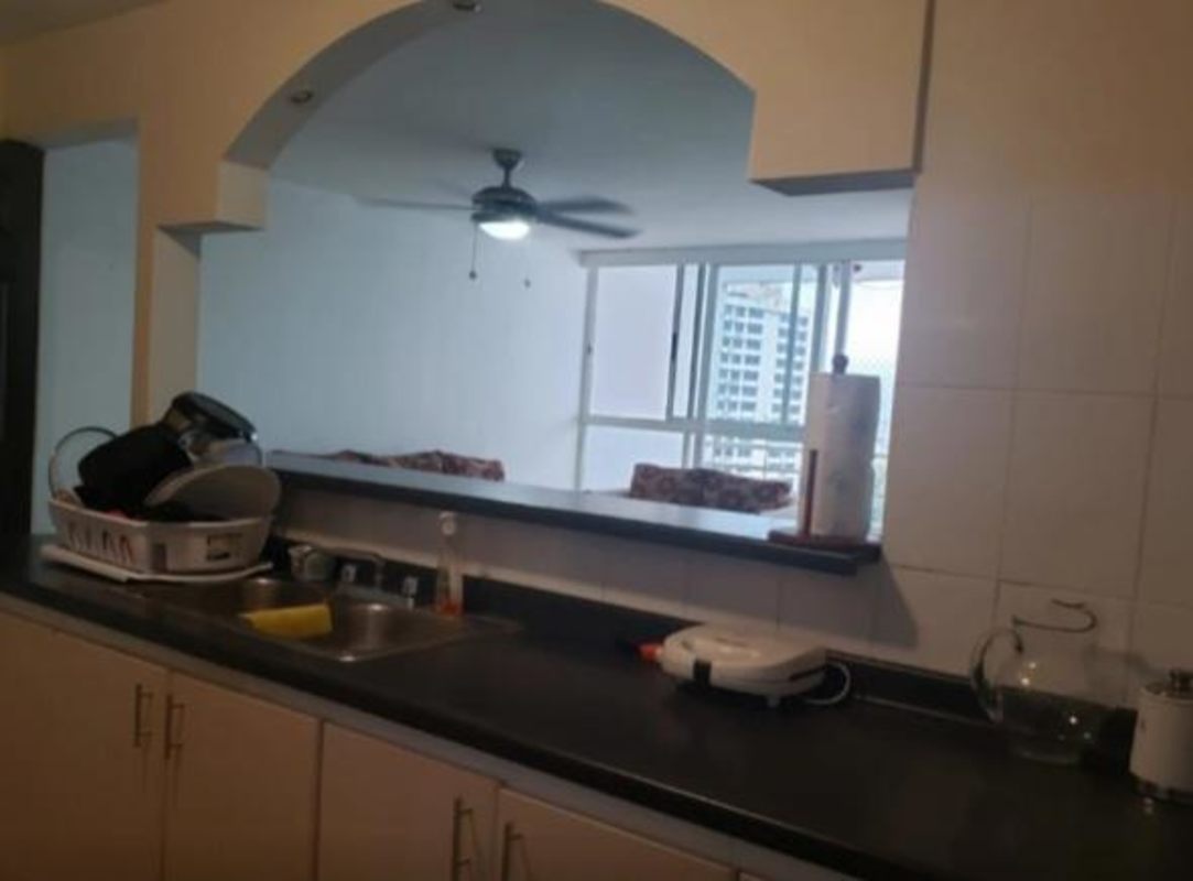 Kitchen area with open pass-through to living space PH RIM Tower Panama