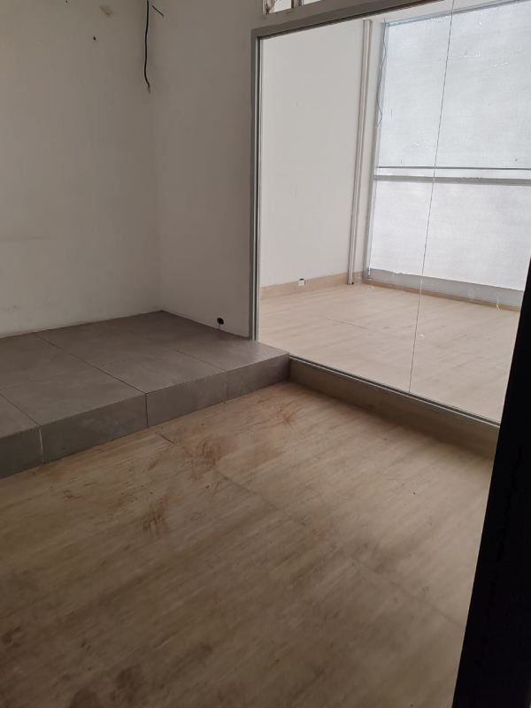 Interior of commercial unit with glass wall and patio light in Plaza 68 San Francisco Panama