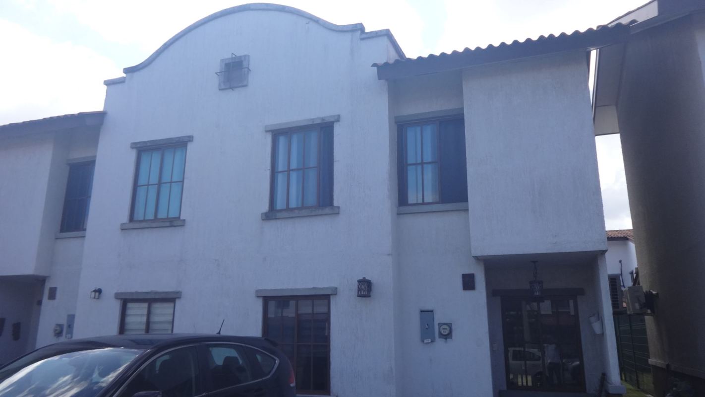 Contemporary kitchen with cabinets, gas stove, and sink Villa Zaita Panama
