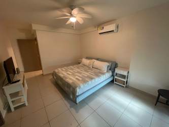 Beachfront condo PH La Ensenada multi-story modern buildings with pool and gardens San Carlos Panama