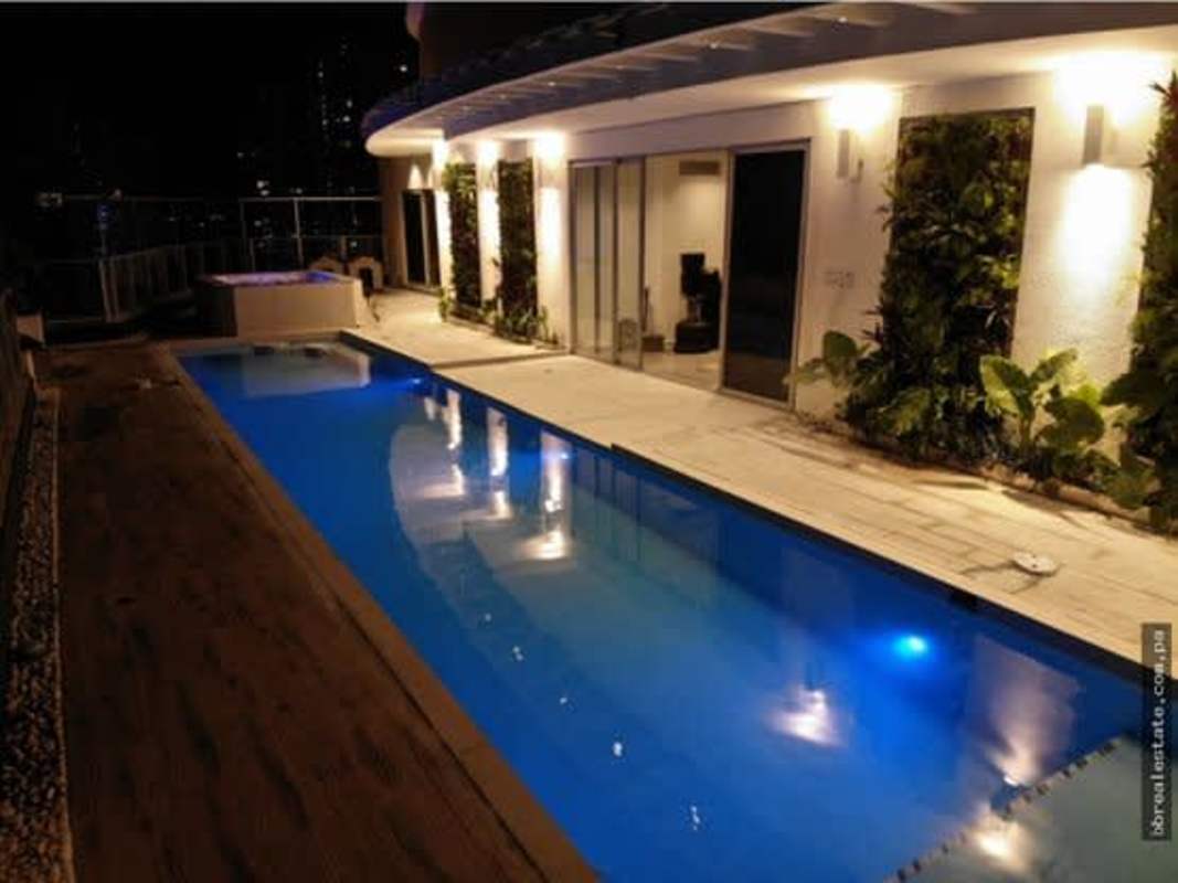 Elegant modern living room with panoramic windows marble floors in PH Blue Bahia Punta Pacífica