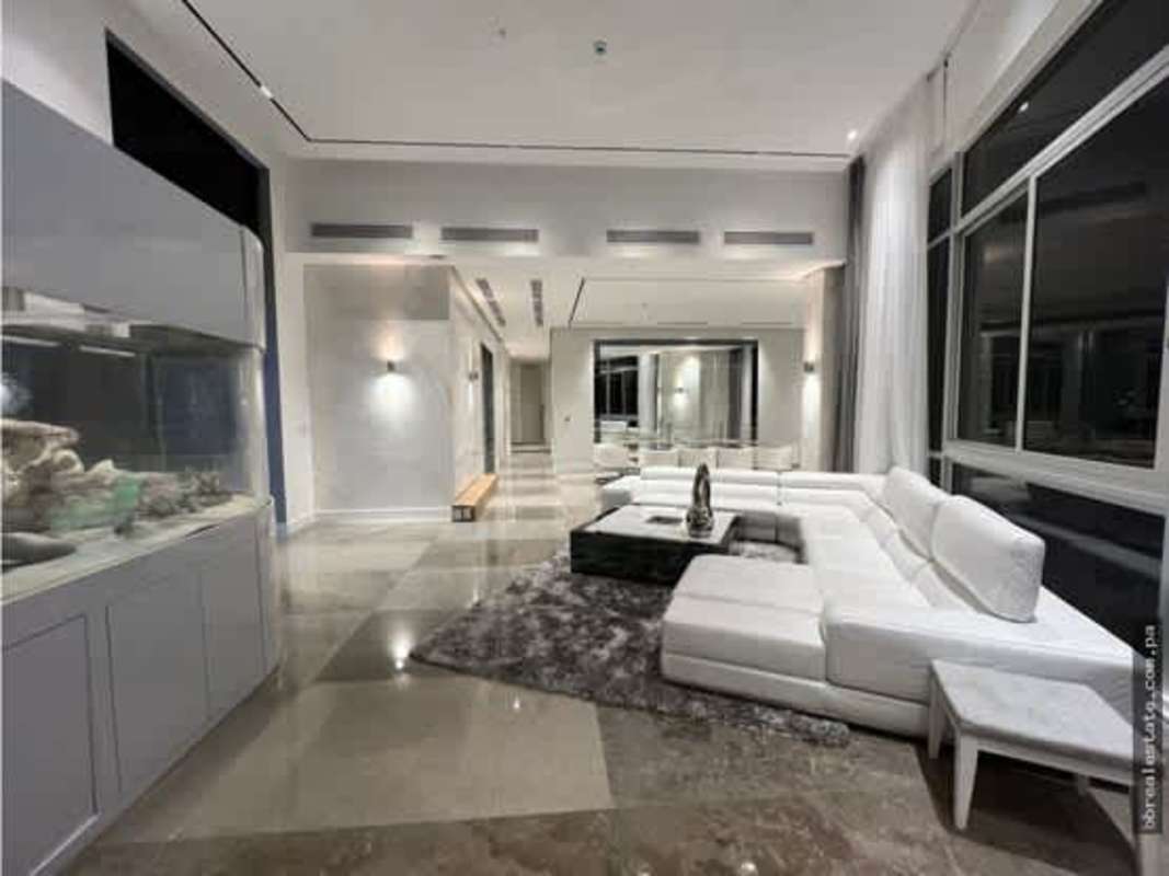 Luxurious kitchen with marble counters, stainless appliances in Blue Bahia Punta Pacífica penthouse