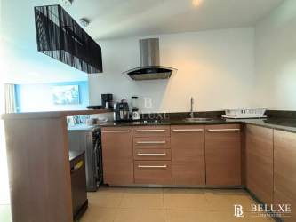 Aerial view of Playa Blanca lagoon pool and tropical resort landscaping