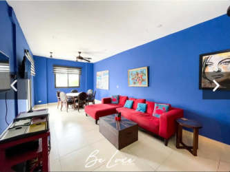 Bright open-plan living dining with terrace access and Pacific ocean view PH Islamar Panama