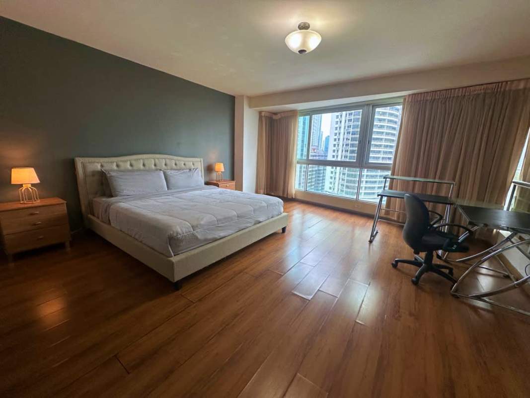 Contemporary bathroom with marble sink and glass shower in Bayfront Loft Panama City