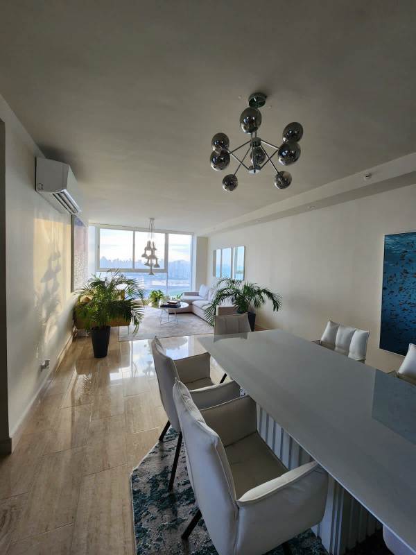 Bathroom with marble countertop and glass shower in PH The Regent Costa del Este Panama