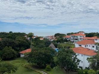 Mediterranean architecture in residential Santander Punta Barco village Panama with ocean beyond