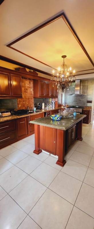 Walk-in closet with ample storage in master suite PH Villa Marina Panama