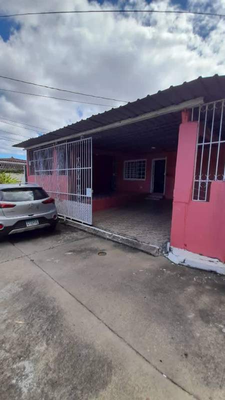 Laundry area corridor with concrete sink window bars ladder Panama house