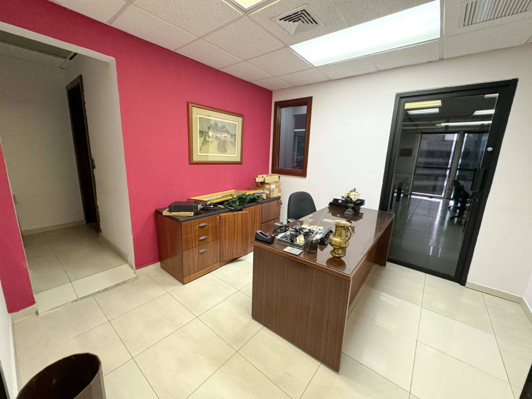 Glass door private office with accent wall, ceramic tile floor in PH Humbold Tower Marbella