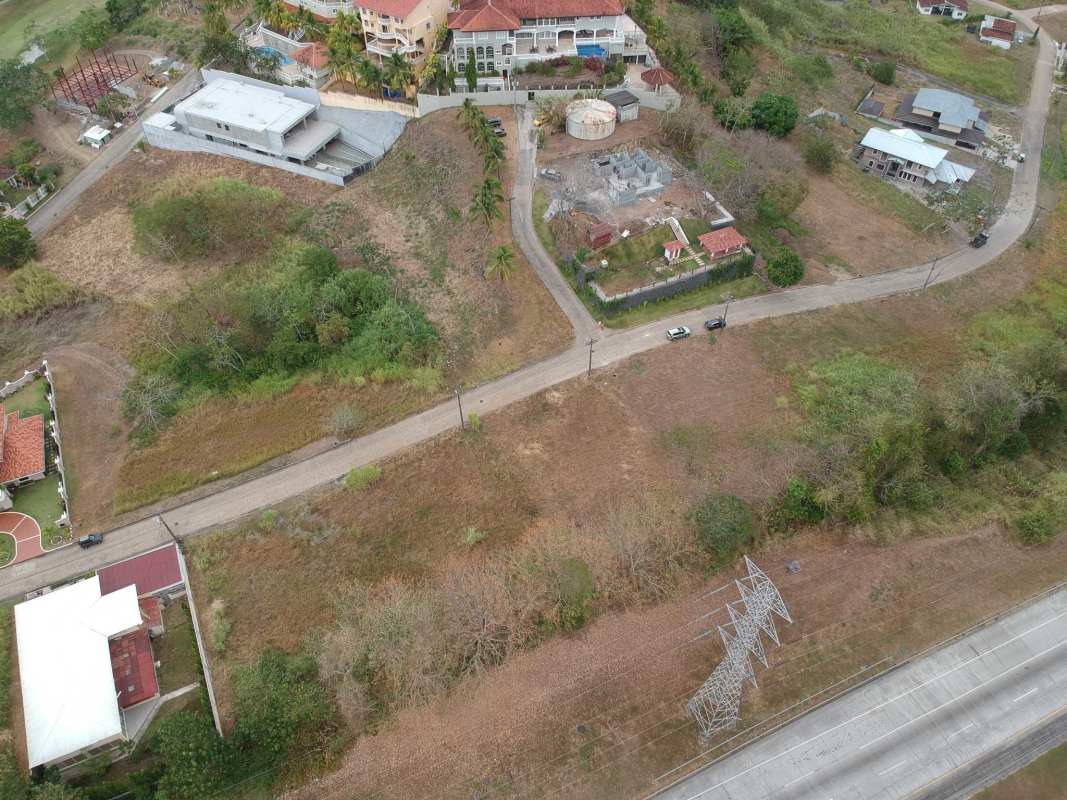 Vacant lot near luxury homes inside Club de Golf community in Panama City