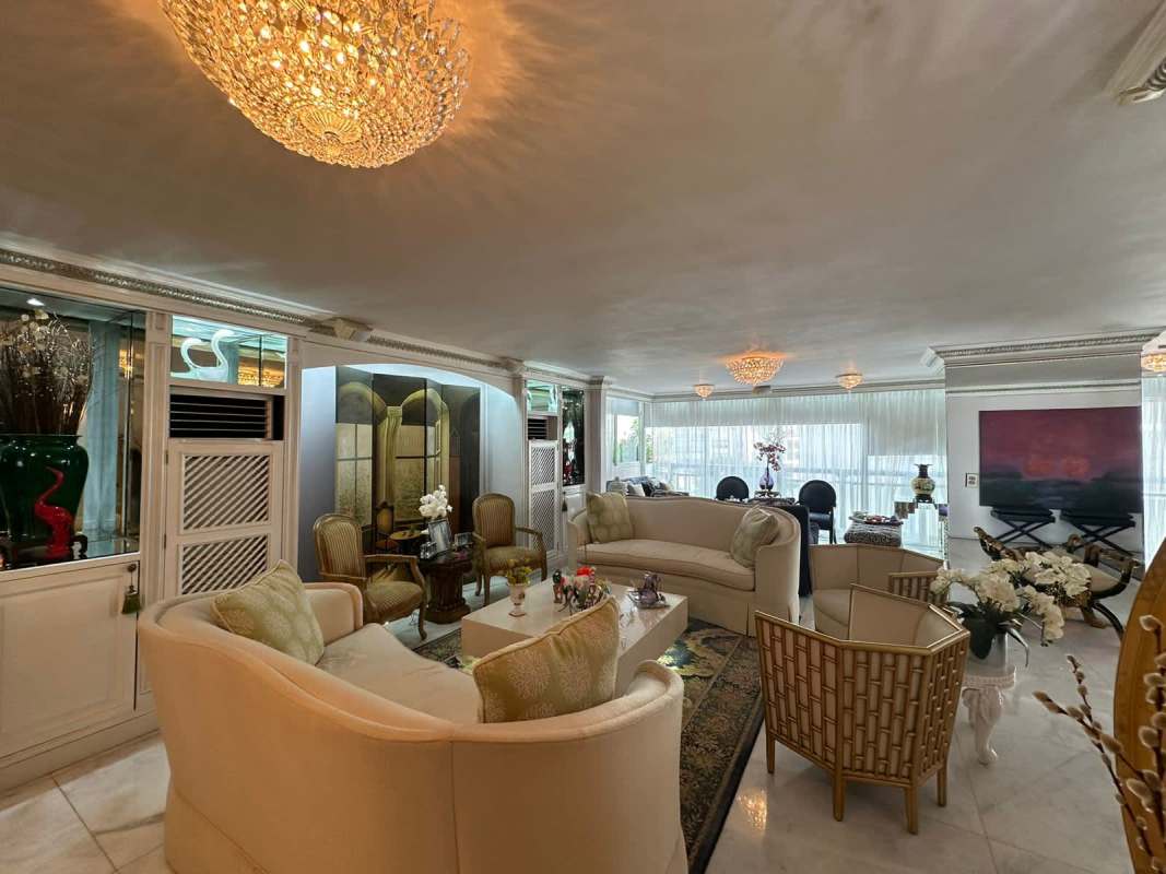 Large living dining area with marble floor chandeliers PH Ritz Punta Paitilla