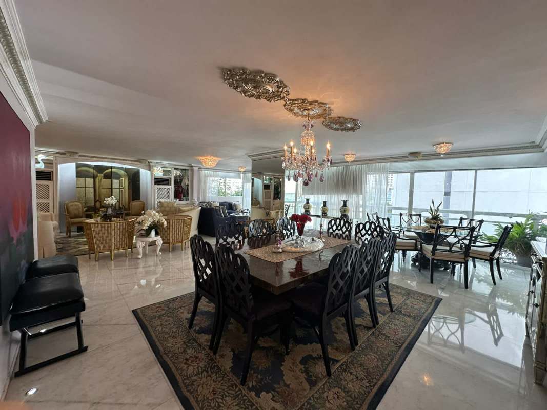 Large kitchen with granite countertops, windows, white cabinets PH Ritz