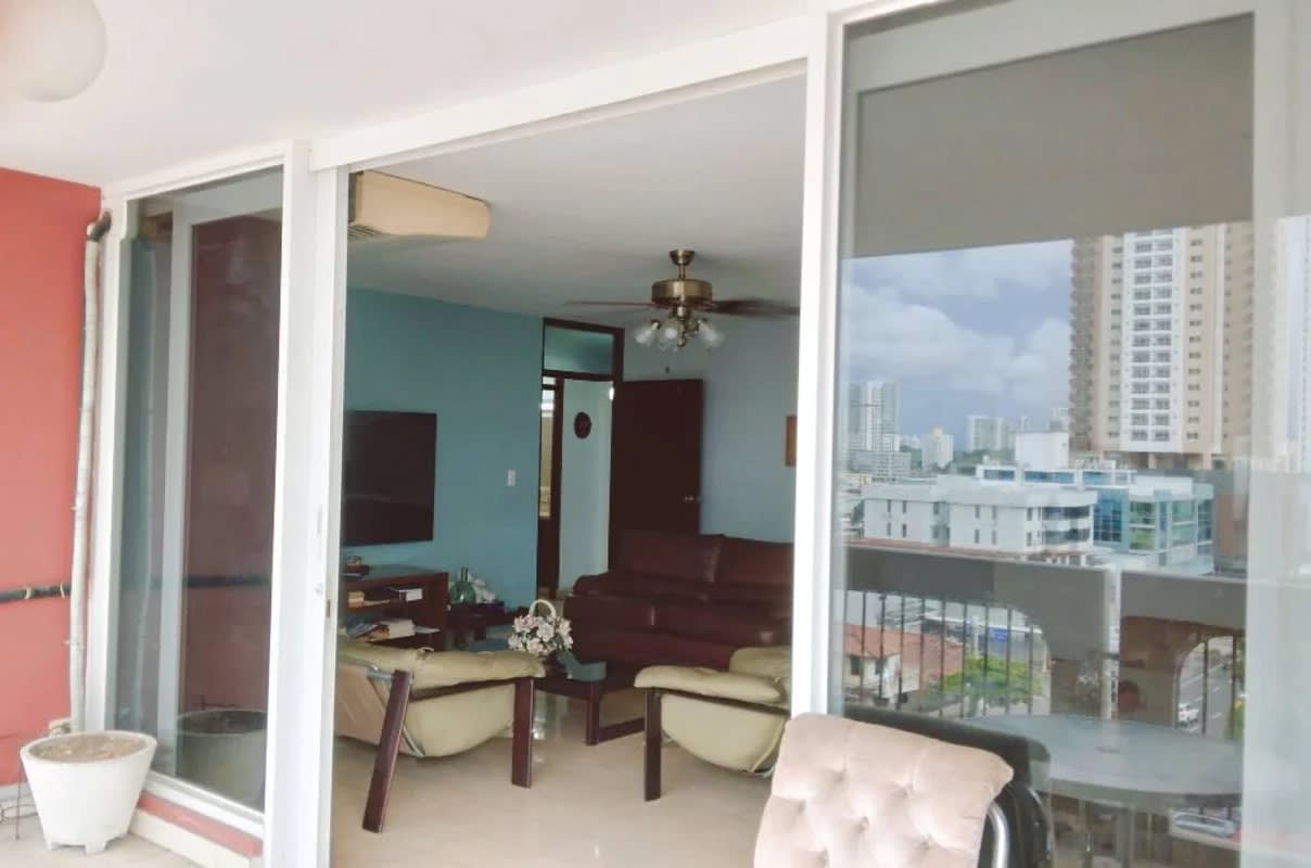 Combined dining living space with balcony in apartment at PH Elege El Carmen Panama City