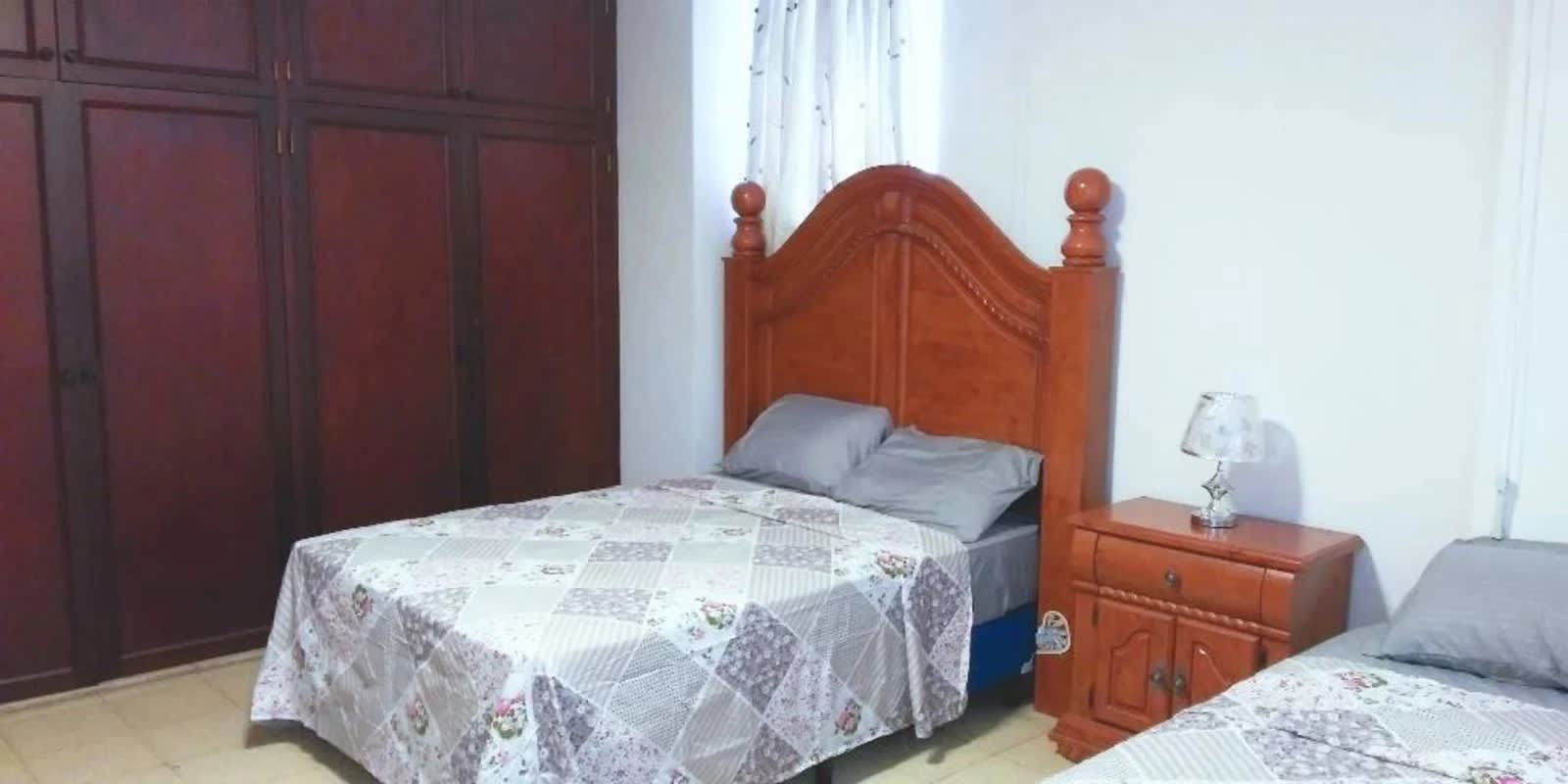 Bathroom with double vanity and marble countertop at PH Elege Panama City
