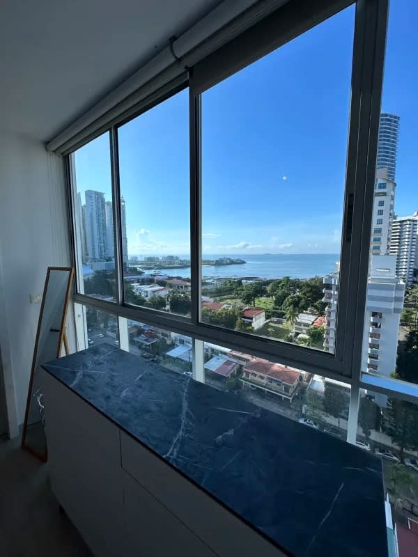 Bright living area with panoramic ocean and skyscraper views Punta Pacifica Panama City