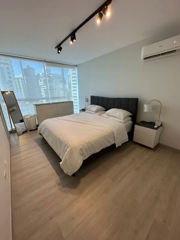 Modern master bedroom overlooking Panama Pacific Ocean skyline PH Pacific Point