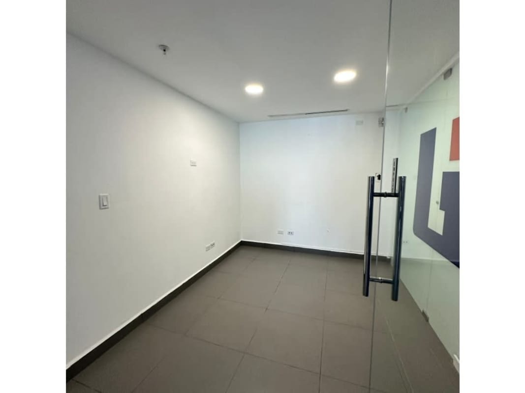 Compact office space glass door recessed lighting Punta Pacifica Panama