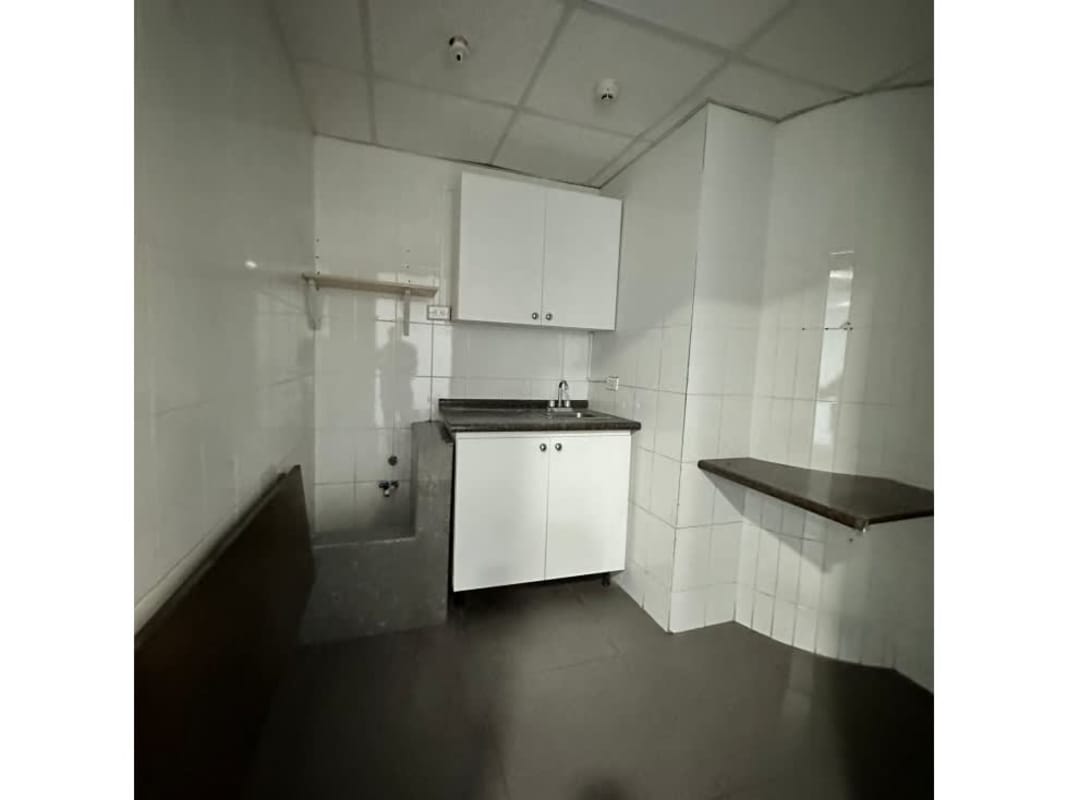 Modern white hallway with recessed lighting office rental Panama