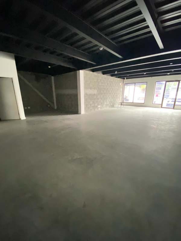 Industrial commercial unit shell with glass doors and concrete floors Rio Abajo Plaza Panama