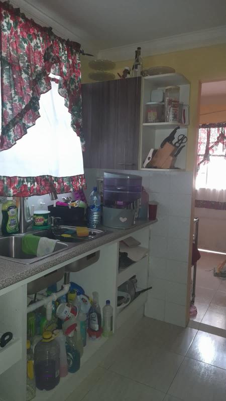 Spacious living room with tile floor, natural light in Brisas del Golf Panama house for sale