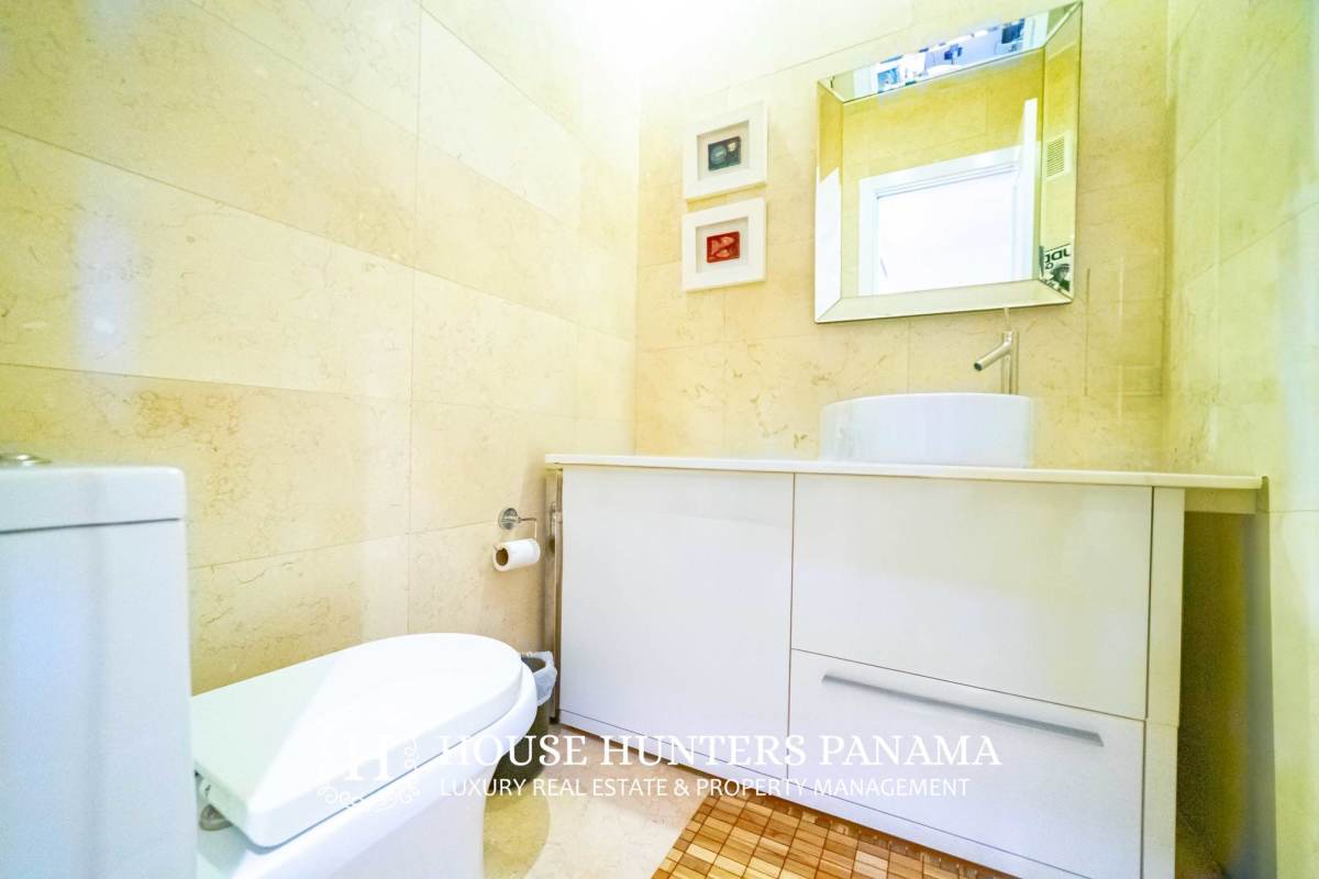 Contemporary bathroom with double sink vanity, glass shower and bathtub at Yoo Panama