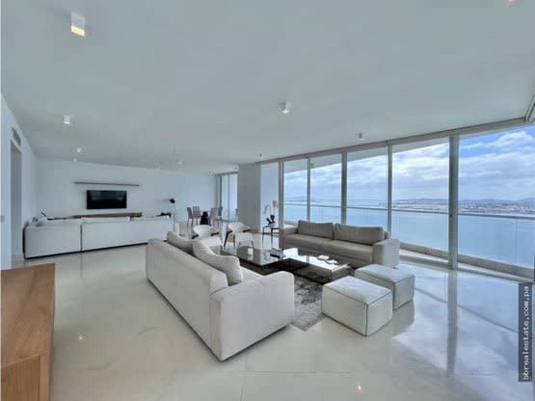 Large master suite with ocean and city views, marble floors, luxurious finishes in The Point Punta Paitilla