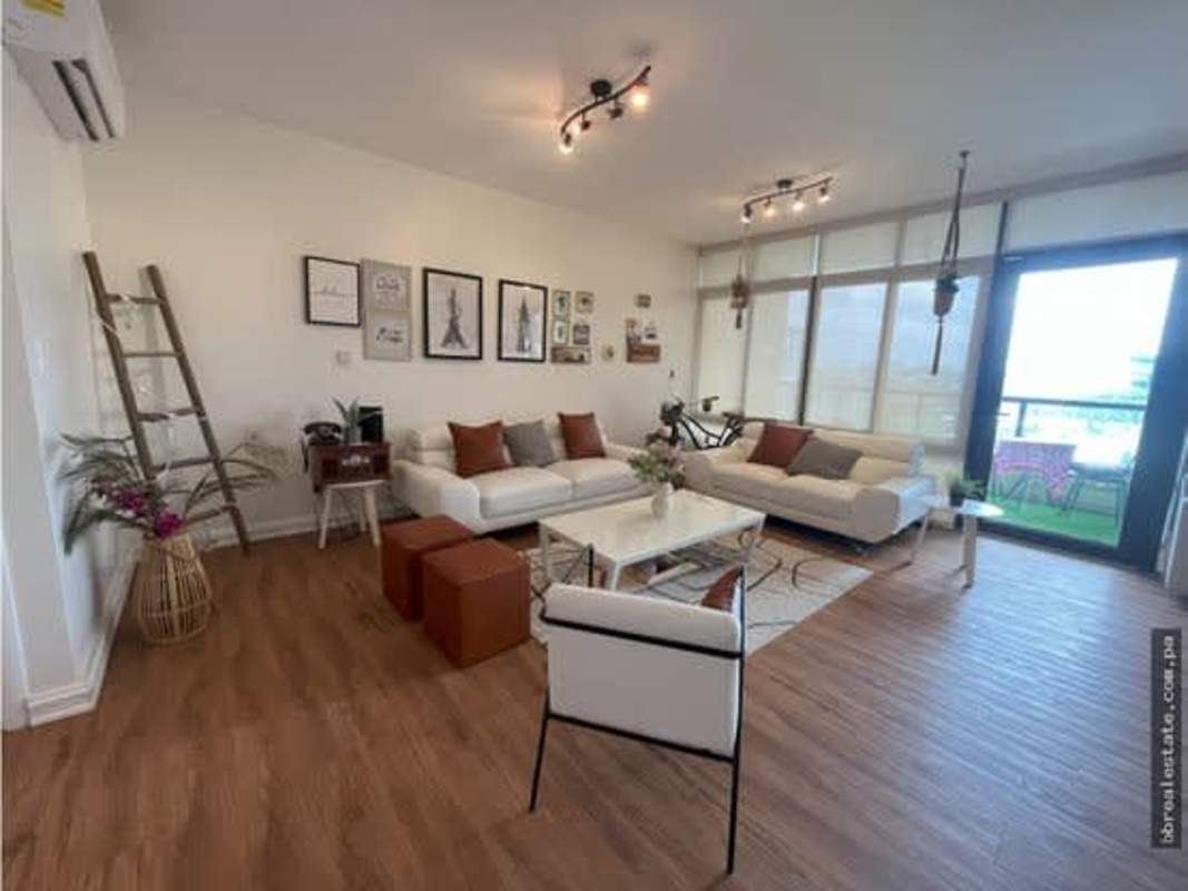 Bright modern living area with balcony access in PH Parque del Mar I Costa del Este Panama City