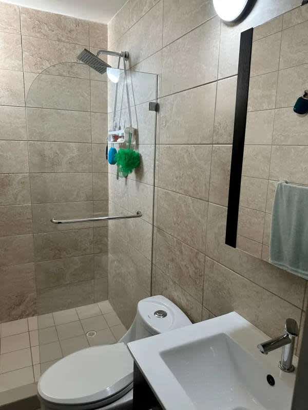 Dining area connected to kitchen and living with city views PH Coral Towers Panama