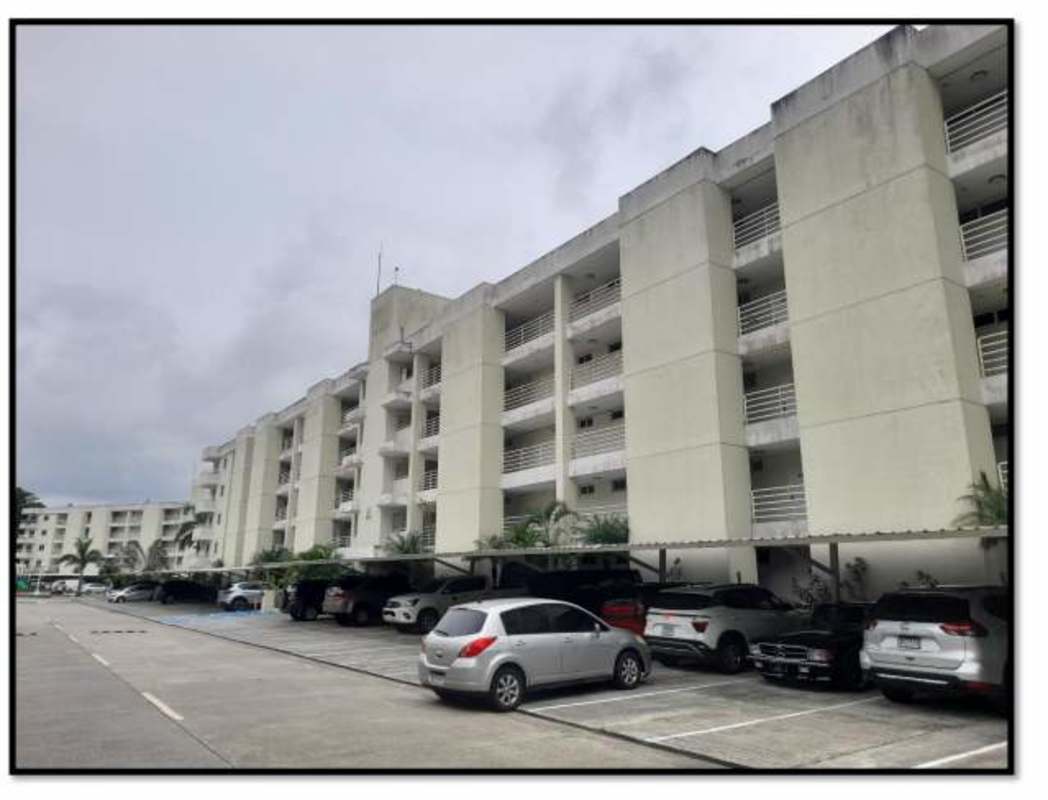 Modern mid-rise apartment building with balconies at PH Altamira Gardens in Clayton, Panama City