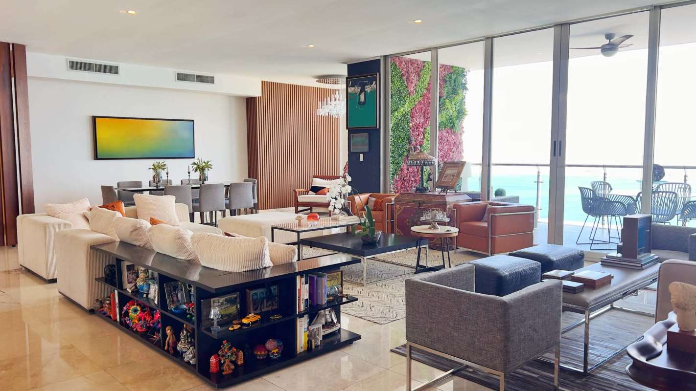 Spacious gourmet kitchen with granite countertops, wood cabinets and stainless appliances in Aqualina Punta Pacifica