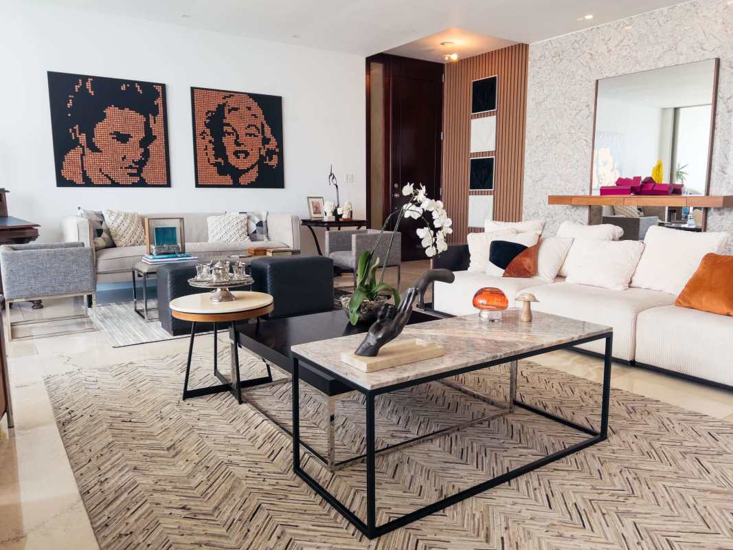 Elegant bathroom with marble finishes, glass shower and ocean views in PH Aqualina Panama