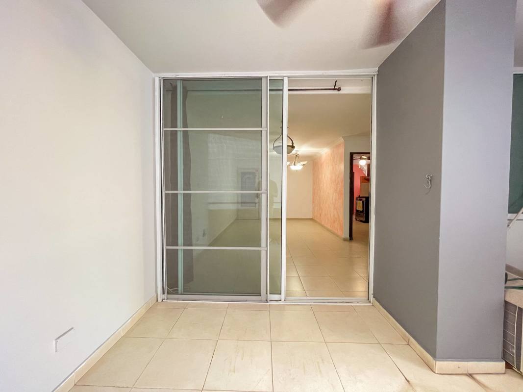 Modern apartment complex outdoor pool with lounge chairs PH Vista Bella Panama