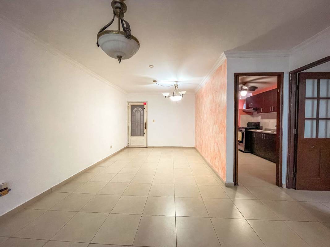 Kitchen with granite counters, dark cabinets, appliances in PH Vista Bella Bella Vista Panama City