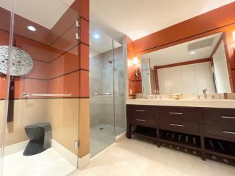 Modern kitchen with stainless steel appliances and granite countertops in beachfront Buenaventura loft