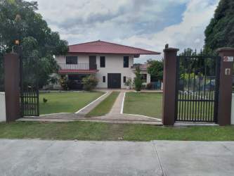 Spacious master bedroom with tile floors, ample light in Costa Verde house for sale